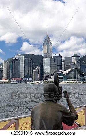 A statue at the Avenue of Stars at Tsim Sha Tsui, Kowloon, Hong Kong View Large Photo Image Stock Image - A statue at the Avenue of Stars at Tsim Sha Tsui, Kowloon, Hong Kong. Fotosearch