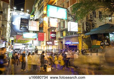 People on the streets at night, in Causeway Bay (Tung Lo Wan), Hong Kong View Large Photo Image Picture - People on the streets at night, in Causeway Bay (Tung Lo Wan), Hong Kong. Fotosearch