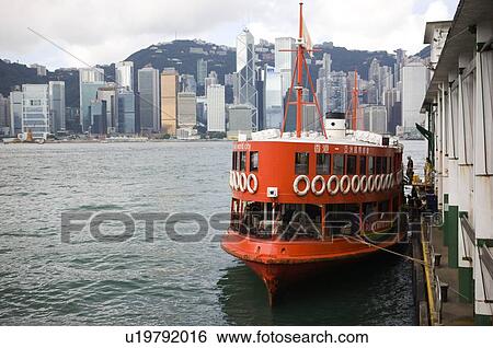 Red ferry at the Star Ferry Pier, Victoria Harbor, Hong Kong View Large Photo Image Stock Photograph - Red ferry at the Star Ferry Pier, Victoria Harbor, Hong Kong. Fotosearch
