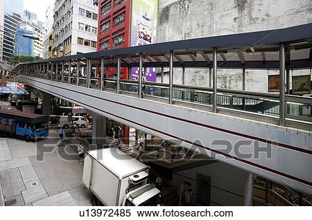Stock Photography - The Central - Mid-Levels Escalator in Central District, Hong Kong. Fotosearch