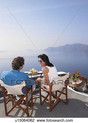 Stock Image - Couple having breakfast. Fotosearch