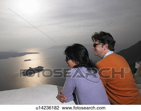 Couple looking at the view View Large Photo Image Stock Image - Couple looking at the view. Fotosearch