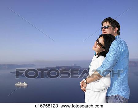 Stock Image - Couple looking at the view. Fotosearch