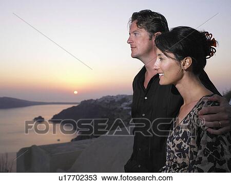 Stock Image - Couple looking at the view. Fotosearch