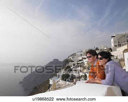 Couple looking at the view View Large Photo Image Stock Image - Couple looking at the view. Fotosearch