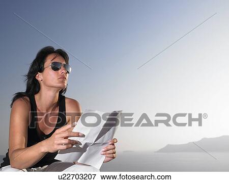 Woman reading a letter View Large Photo Image Stock Photo - Woman reading a letter. Fotosearch