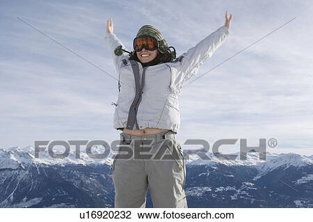 Female jumping in snow View Large Photo Image Stock Image - Female jumping in snow. Fotosearch