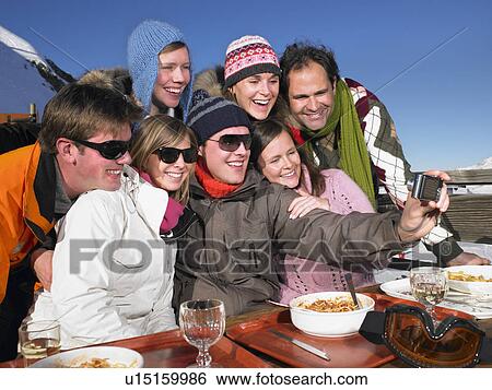 Group taking picture of themselves View Large Photo Image Stock Photograph - Group taking picture of themselves. Fotosearch