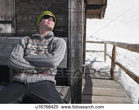 Man enjoying sun on terrace View Large Photo Image Stock Photography - Man enjoying sun on terrace. Fotosearch