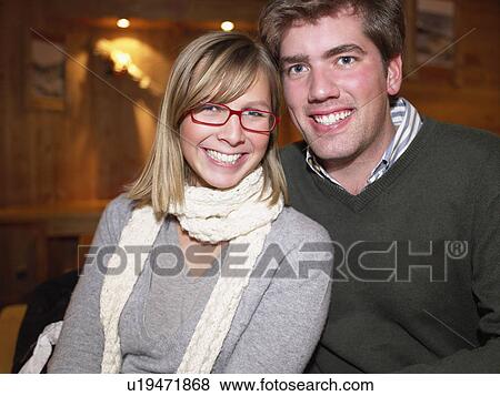 Smiling couple in restaurant View Large Photo Image Stock Photo - Smiling couple in restaurant. Fotosearch