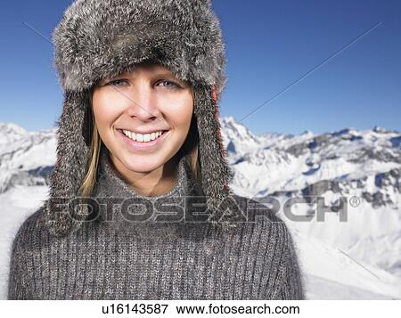 Stock Photo - Young woman in hat . Fotosearch