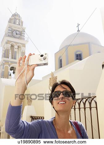 Woman taking pictures View Large Photo Image Stock Photography - Woman taking pictures. Fotosearch