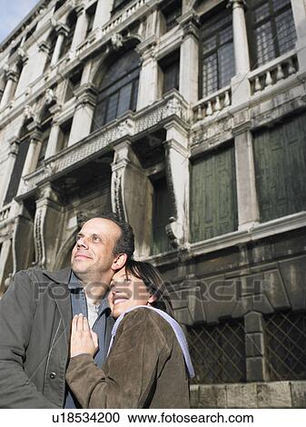 Italy, Venice, couple embracing, smiling View Large Photo Image Stock Image - Italy, Venice, couple embracing, smiling. Fotosearch
