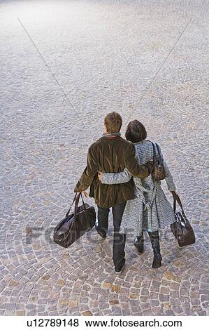 Man and woman arms around waists. View Large Photo Image Stock Photo - Man and woman arms around waists.. Fotosearch