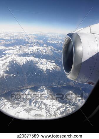 View through airplane window View Large Photo Image Stock Photo - View through airplane window. Fotosearch