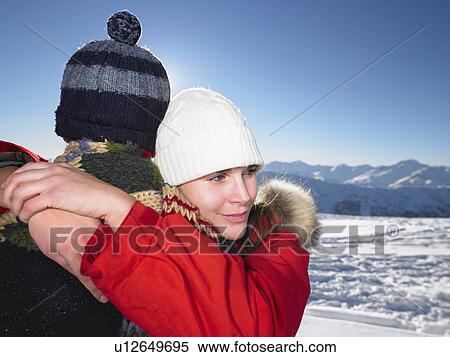 Couple hugging on mountain top View Large Photo Image Stock Photography - Couple hugging on mountain top. Fotosearch