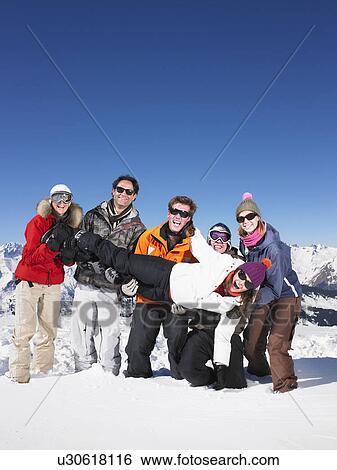 Group carrying young woman View Large Photo Image Stock Photograph - Group carrying young woman. Fotosearch