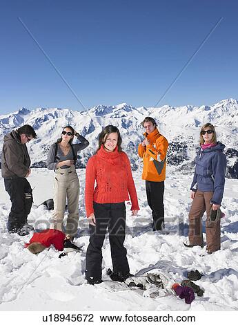 Group changing in snow View Large Photo Image Stock Image - Group changing in snow. Fotosearch