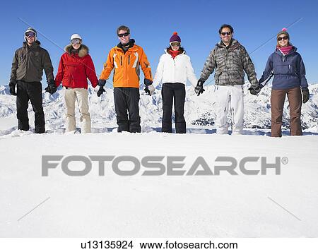 Group holding hands at mountain View Large Photo Image Picture - Group holding hands at mountain. Fotosearch