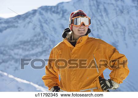 Stock Photography - Portrait of woman in mountains. Fotosearch