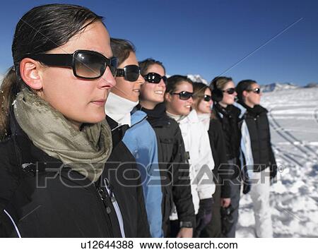 Young women in sunglasses at mountains View Large Photo Image Stock Photo - Young women in sunglasses at mountains. Fotosearch