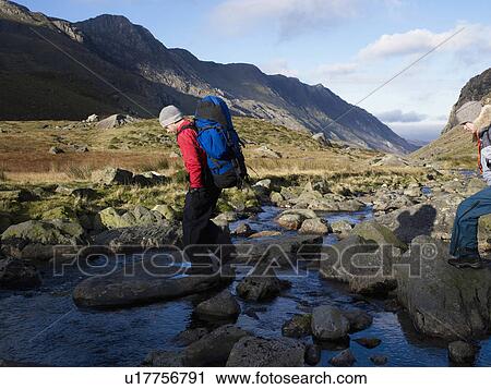 Couple walking. View Large Photo Image Stock Image - Couple walking.. Fotosearch