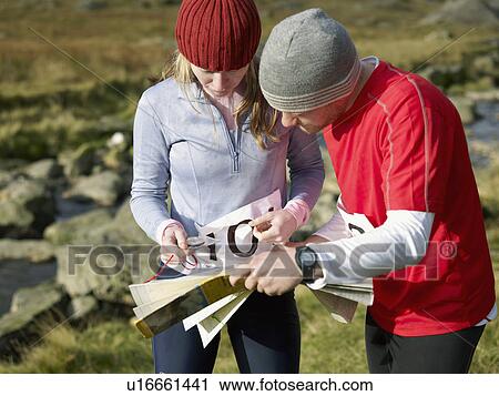 Couple with map. View Large Photo Image Stock Image - Couple with map.. Fotosearch