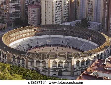 Spain, Andalusia, Malaga, matadors training in bullring, elevated view View Large Photo Image Picture - Spain, Andalusia, Malaga, matadors training in bullring, elevated view. Fotosearch