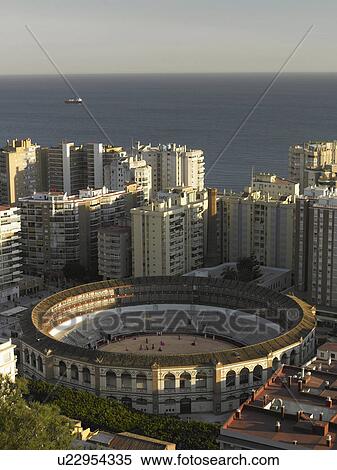 Spain, Andalusia, Malaga, matadors training in bullring, elevated view View Large Photo Image Stock Photography - Spain, Andalusia, Malaga, matadors training in bullring, elevated view. Fotosearch