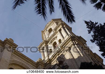 Stock Image - Spain, Andalusia, Malaga, Old Town, cathedral exterior, low angle view. Fotosearch