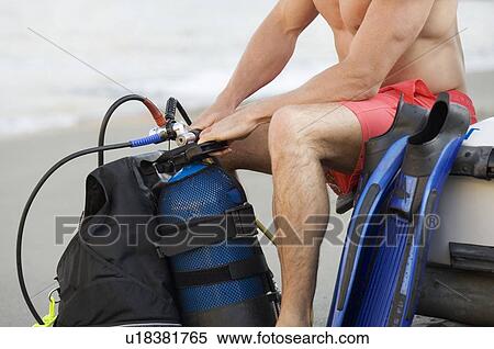 Stock Photography - A male scuba diver. Fotosearch