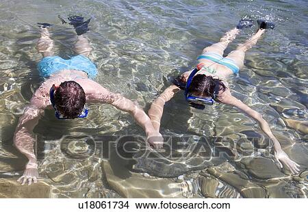 Picture - A couple snorkeling together. Fotosearch