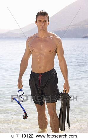 Stock Image - A man snorkeling. Fotosearch