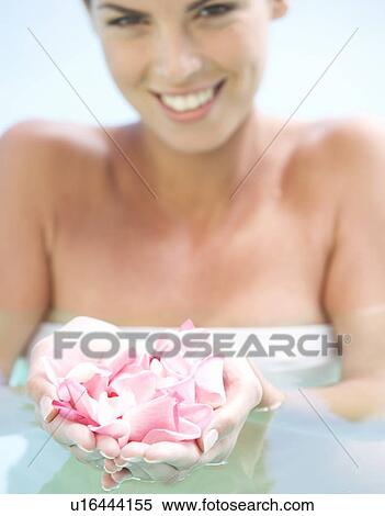 Portrait of a young woman in a swimming pool View Large Photo Image Stock Photography - Portrait of a young woman in a swimming pool. Fotosearch