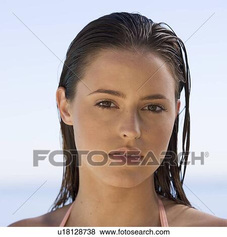 Stock Photo - Portrait of a young woman. Fotosearch