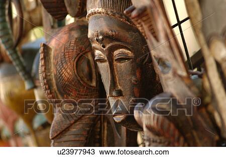 Stock Image - Masks at Green Market. Fotosearch