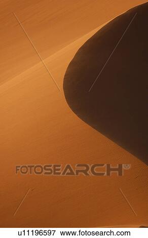 Stock Photo - Sand Dunes of Sossusvlei - Namib desert, Namibia. Fotosearch