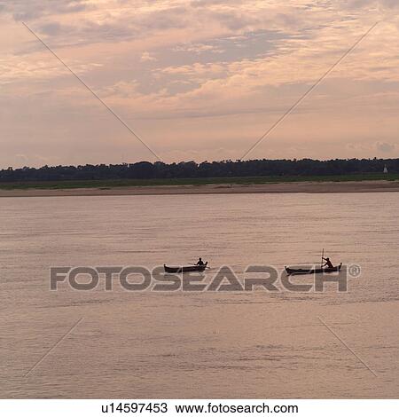 Row boats on the Ayeyarwady River View Large Photo Image Stock Image - Row boats on the Ayeyarwady River. Fotosearch