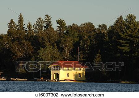 Stock Image - Boathouse at Lake of the Woods. Fotosearch