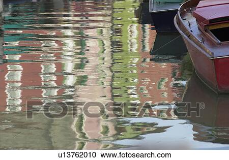 Stock Image - Boats on a canal in Venice, Burano, Italy. Fotosearch