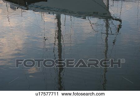 Reflection of a Boat docked at a harbor View Large Photo Image Stock Image - Reflection of a Boat docked at a harbor. Fotosearch