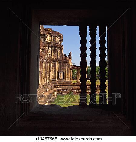 Stock Photography - Opening through wall at the Khmer Kingdom palace ruins. Fotosearch