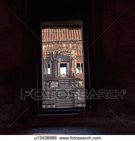 Stock Photo - Passageway looking through to the Khmer Kingdom palace ruins. Fotosearch