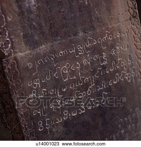 Written script on a stone tablet at the Khmer Kingdom palace ruins View Large Photo Image Stock Image - Written script on a stone tablet at the Khmer Kingdom palace ruins. Fotosearch