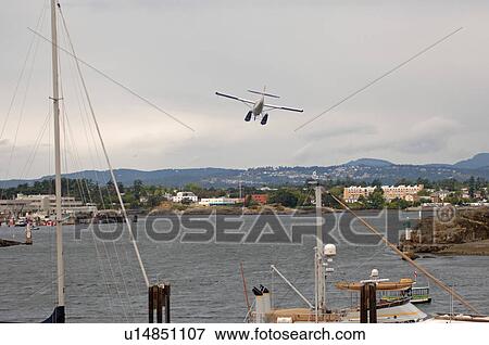 Stock Photo - Float plane in harbour, Victoria, British Columbia, Canada. Fotosearch