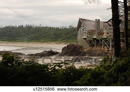 Stock Photograph - Lodge on shoreline, Wickaninnish Beach Trail, Vancouver Island, Canada. Fotosearch