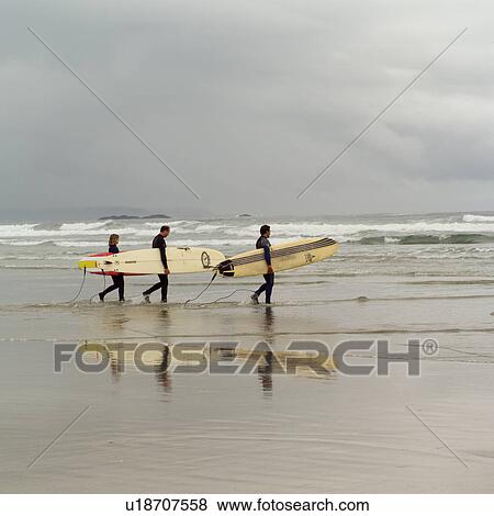 Surfers with surfboards on beach, Pacific Rim Park, Vancouver Island, Canada View Large Photo Image Stock Photo - Surfers with surfboards on beach, Pacific Rim Park, Vancouver Island, Canada. Fotosearch