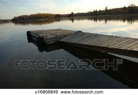 Boat Dock extending onto Lake View Large Photo Image Stock Photo - Boat Dock extending onto Lake. Fotosearch
