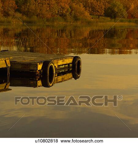 Reflection of Boat Dock at Lake View Large Photo Image Stock Photo - Reflection of Boat Dock at Lake. Fotosearch