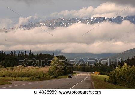 Highway through Rocky Mountains, Jasper National Park, Canada View Large Photo Image Stock Photo - Highway through Rocky Mountains, Jasper National Park, Canada. Fotosearch